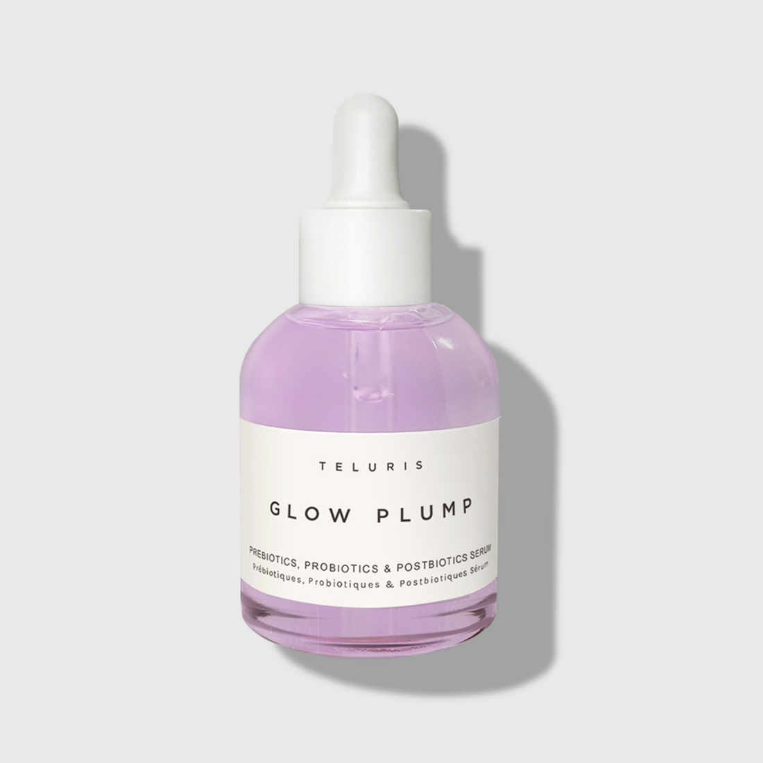 Glow Plump Serum bottle vegan formula for deep hydration and sensitive skin care.